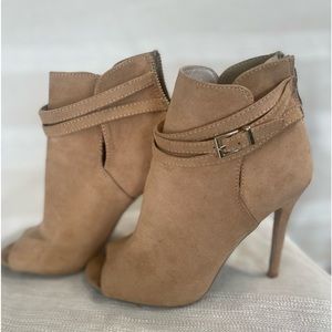 Suede tan open toe heel booties with a belt wrapped at the top